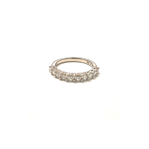Platinum ring with small diamonds on a white background